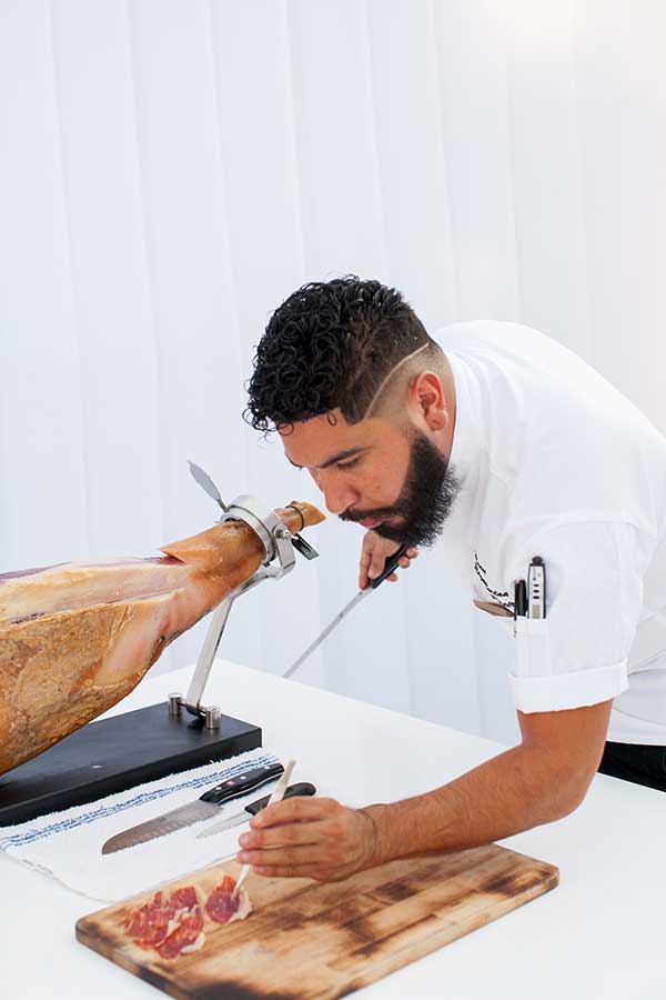 Chef cutting meat